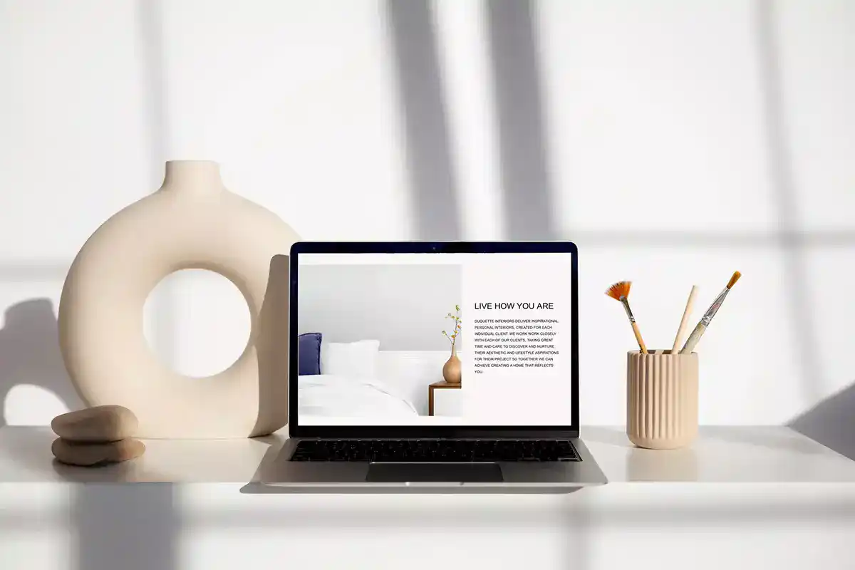 studio-estila-duquette-interior-designers-website-laptop-imgwebp